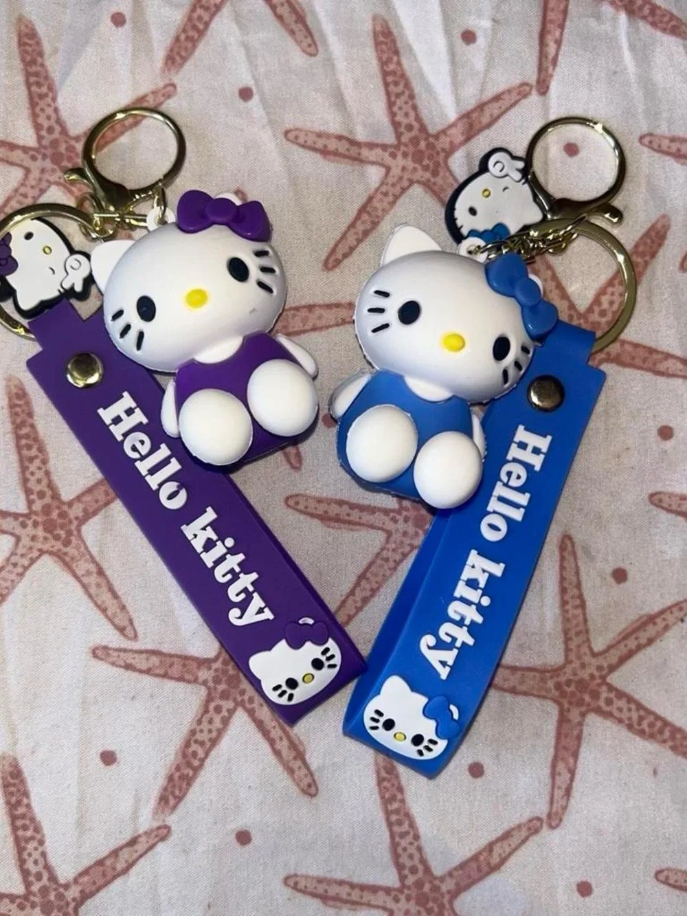 Sanrio Hello Kitty Keychain Set in Purple and Blue